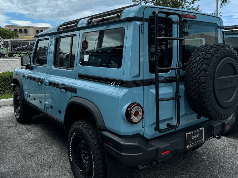 Light blue Ineos Grenadier ready for pickup at the dealership